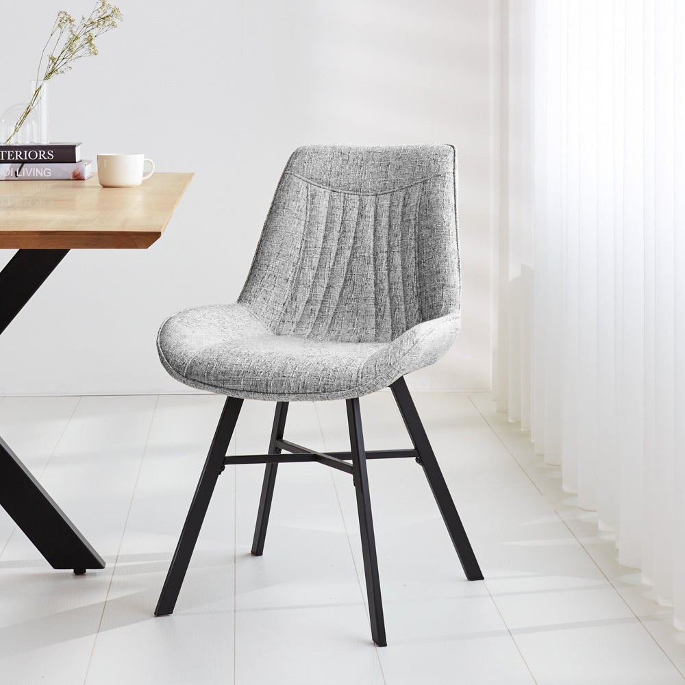 Esszimmerstuhl Jada Dimehouse Grau LxBxH 79x57x53 Stoff Stimmungsvolles Foto diagonal von vorne