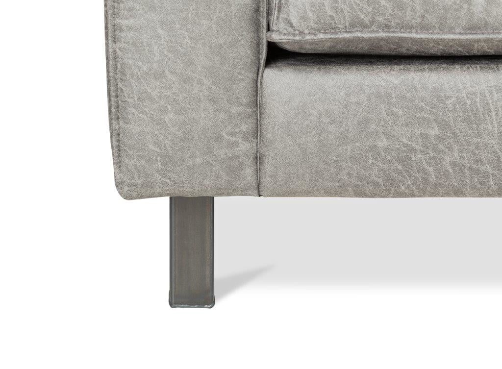 Sofa Tulin DeGeBe Grauer Stoff Weißes Fotodetail