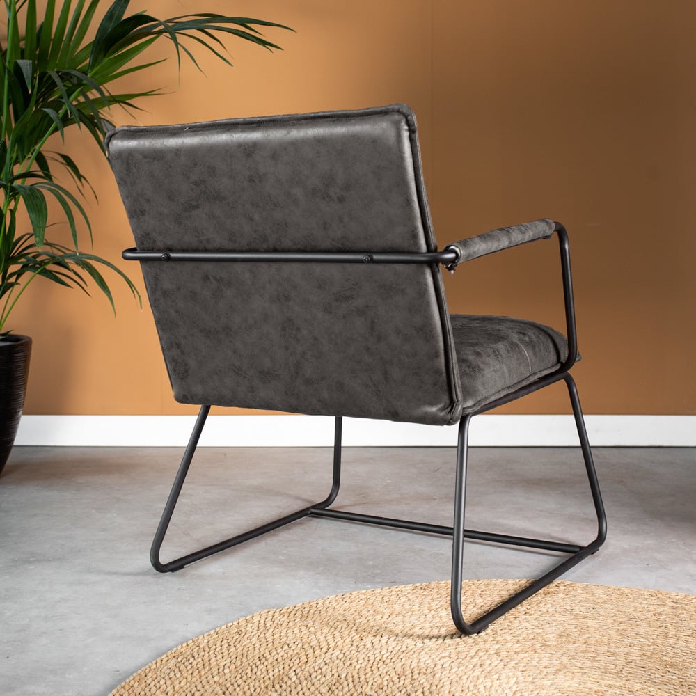 Sessel Hailey Ökoleder Dimehouse Anthrazit LxBxH 66x64x37 Öko-Leder Stimmungsvolle Fotodiagonale Rückansicht
