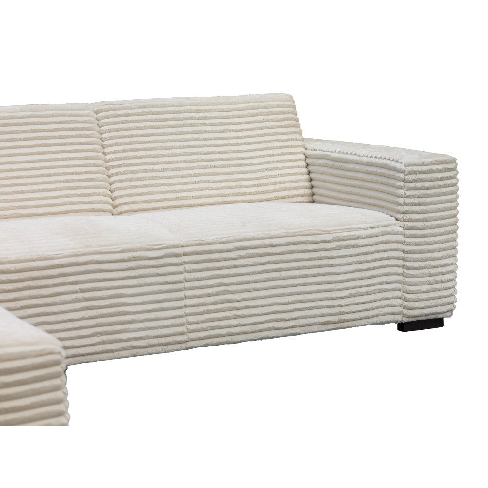 Sofa Gavi DeGeBe Cremefarbener Rippstoff Weißes Fotodetail