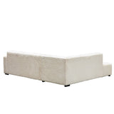 Sofa Gavi DeGeBe Cremefarbener Rippstoff Weißes Foto diagonale Rückansicht
