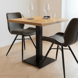 Bistrotisch Mangoholz Quadratisches, stimmungsvolles Foto in einem modernen Interieur