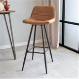 Barhocker Kenton Dimehouse Cognac LxBxH 84x54x49 Mikrofaser Stimmungsvolles Foto diagonal von vorne