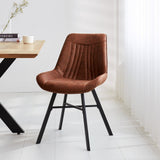 Esszimmerstuhl Jada Ecoleer Dimehouse Cognac LxBxH 79x57x53 Öko-Leder Stimmungsvolles Foto diagonale Vorderansicht