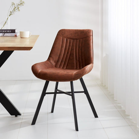 Esszimmerstuhl Jada Ecoleer Dimehouse Cognac LxBxH 79x57x53 Öko-Leder Stimmungsvolles Foto diagonale Vorderansicht