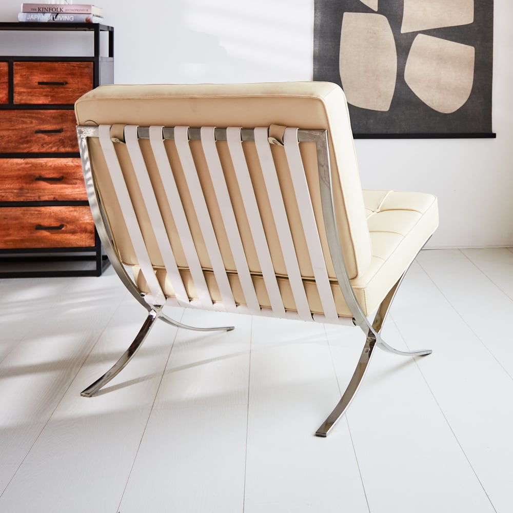 Sessel Expo Dimehouse Creme LxBxH 80x78x78 Rindsleder Stimmungsvolles Foto diagonale Rückansicht