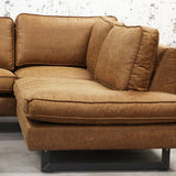 Sofa Tulin DeGeBe Cognac Stoff Stimmungsvolles Foto Vorderansicht