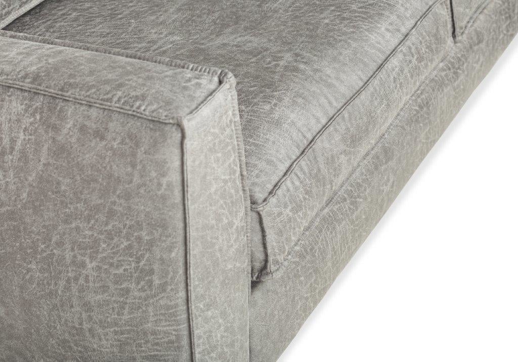 Sofa Tulin DeGeBe Grauer Stoff Weißes Fotodetail