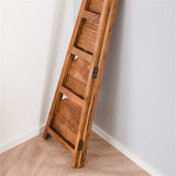 Eckregal Jess DH Interior Akazie LxBxH 135x50x12 Akazienholz Stimmungsvolles Foto in der Situation