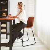 Barhocker Mark Kunstleder Dimehouse Cognac LxBxH 79x65x54 Kunstleder Stimmungsvolles Foto in der Situation