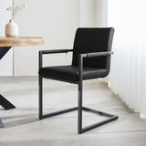 Esszimmerstuhl Kuba Dimehouse Schwarz LxBxH 71x59x58 Kunstleder Stimmungsfoto schräger Vorderansicht