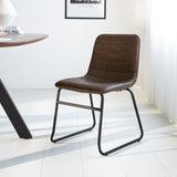 Esszimmerstuhl Mark Dimehouse Taupe LxBxH 74x56x54 Kunstleder Stimmungsvolles Foto schräge Vorderansicht