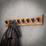 Garderobe Levi DH Interior Akazie LxBxH 92x21x15 Akazienholz Stimmungsvolles Foto diagonale Vorderansicht