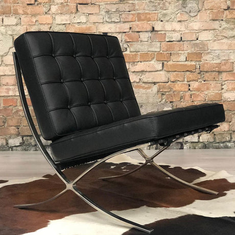 Sessel Expo Dimehouse Schwarz LxBxH 80x78x78 Rindsleder Stimmungsvolles Foto schräge Rückansicht